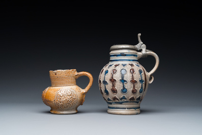 A stoneware armorial jug and a pewter-mounted jug, Raeren and Westerwald, 16/17th C.