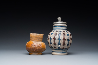 A stoneware armorial jug and a pewter-mounted jug, Raeren and Westerwald, 16/17th C.