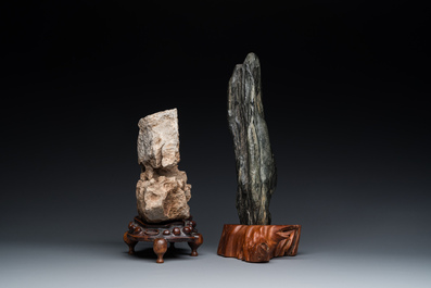 Twee Chinese 'gongshi' stenen voor een geleerde op houten sokkels, Ming of later