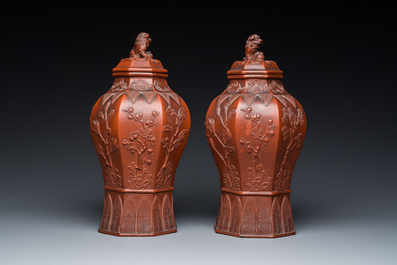 An extremely rare pair of Chinese Yixing stoneware octagonal vases and covers, Kangxi