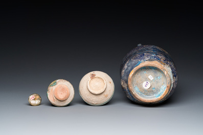 Three blue- and turquoise-glazed Islamic pottery wares and a glass bottle, Kashan and Raqqa, 12th C. and later