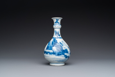 A Chinese blue and white bottle vase with figures in a landscape, Kangxi