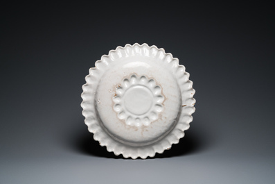 A large French white-glazed relief-decorated dish, Saint-Jean-du-D&eacute;sert, Marseille, France, 17th C.