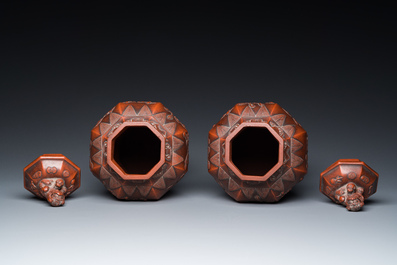 An extremely rare pair of Chinese Yixing stoneware octagonal vases and covers, Kangxi