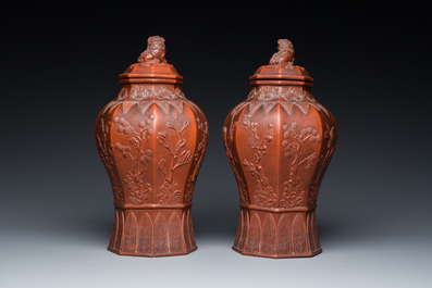 An extremely rare pair of Chinese Yixing stoneware octagonal vases and covers, Kangxi