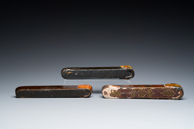 Three lacquered papier-mach&eacute; pen boxes or qalamdans, Qajar, Persia, 19th C.