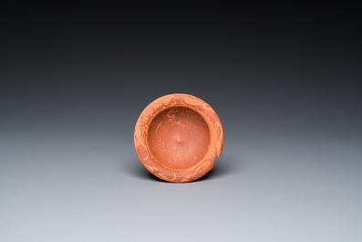 Four Roman glass bottles, two pottery oil lamps and a bowl