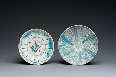 A blue and white Safavid hookah base, a Kashan bowl and a Kutahya plate, Persia and Turkey, 14th C. and later