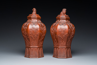 An extremely rare pair of Chinese Yixing stoneware octagonal vases and covers, Kangxi