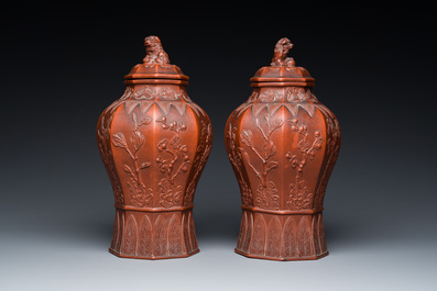 An extremely rare pair of Chinese Yixing stoneware octagonal vases and covers, Kangxi