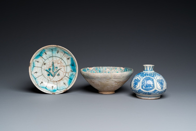 A blue and white Safavid hookah base, a Kashan bowl and a Kutahya plate, Persia and Turkey, 14th C. and later