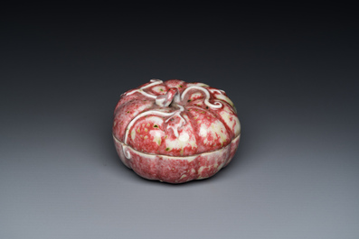 A Chinese peachbloom-glazed pumpkin-shaped box and cover, 19th C.