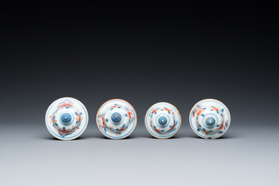A Chinese Imari-style garniture of six vases with floral design, Kangxi