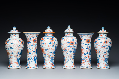 A Chinese Imari-style garniture of six vases with floral design, Kangxi