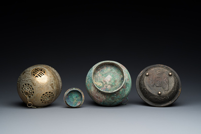 A varied collection of Chinese and Tibetan bronze, brass and wood objects, 19/20th C.