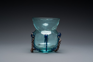 A light blue glass mosque lamp, Syria or Persia, 10th C.