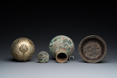 A varied collection of Chinese and Tibetan bronze, brass and wood objects, 19/20th C.