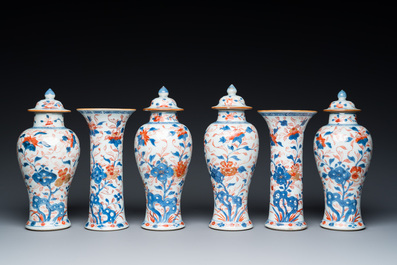 A Chinese Imari-style garniture of six vases with floral design, Kangxi