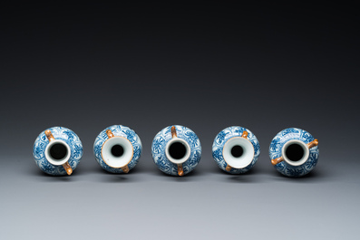 A Chinese blue and white garniture of five vases with floral design, Kangxi