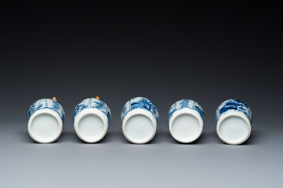 A Chinese blue and white garniture of five vases with floral design, Kangxi