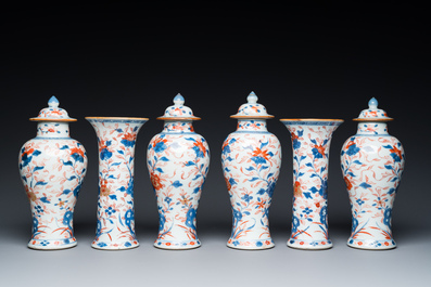 A Chinese Imari-style garniture of six vases with floral design, Kangxi