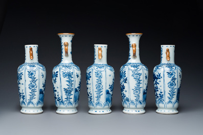 A Chinese blue and white garniture of five vases with floral design, Kangxi