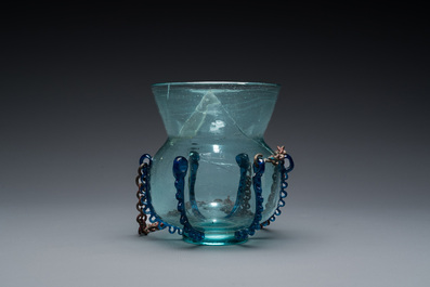 A light blue glass mosque lamp, Syria or Persia, 10th C.