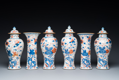 A Chinese Imari-style garniture of six vases with floral design, Kangxi