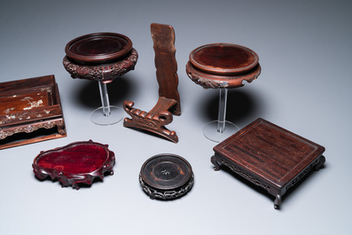 Six Chinese wooden stands and three trays with inlay of mother-of-pearl, 19/20th C.