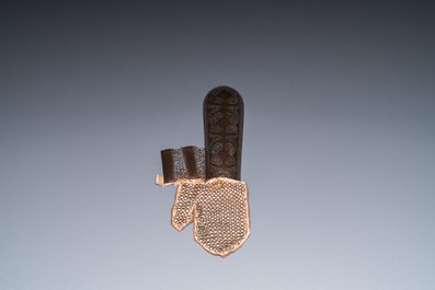 A Qajar tinned copper helmet (khula khud), shield (dhal) and arm piece (dastana), Persia, 19th C.