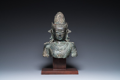 A large Javanese bronze Majapahit bust of the god Shiva, Indonesia, probably 15/16th C.