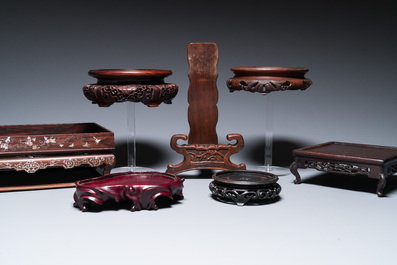 Six Chinese wooden stands and three trays with inlay of mother-of-pearl, 19/20th C.