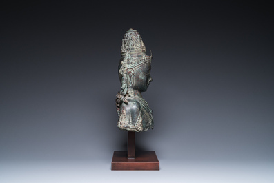 A large Javanese bronze Majapahit bust of the god Shiva, Indonesia, probably 15/16th C.