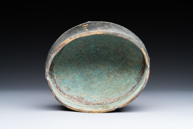 A Chinese archaic bronze ritual 'you' wine vessel and cover in Western Zhou-style, Ming