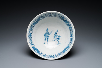 A very fine and rare Dutch Delft blue and white bowl with grotesques in the style of Daniel Marot, dated 1720
