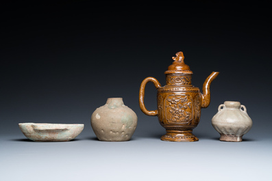 A Chinese qingbai-glazed ear cup, two celadon jarlets and a brown-glazed jug and cover, Han and later