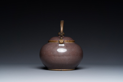 A Chinese polished purple Yixing stoneware teapot and cover for the Thai market, Gong Ju 貢局 mark, 19th C.