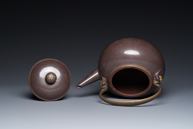 A Chinese polished purple Yixing stoneware teapot and cover for the Thai market, Gong Ju 貢局 mark, 19th C.