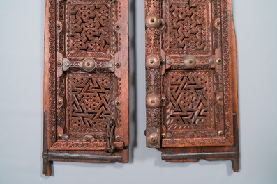 A pair of reticulated wooden doors with geometrical patterns, Northern Africa, 19th C.