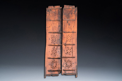 A pair of reticulated wooden doors with geometrical patterns, Northern Africa, 19th C.