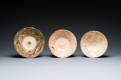 Eleven various Islamic pottery wares, 10th C. and later