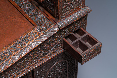 A colonial Anglo-Indian reticulated wooden desk with hidden compartment, 19th C.