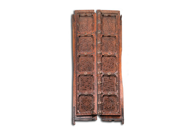 A pair of reticulated wooden doors with geometrical patterns, Northern Africa, 19th C.