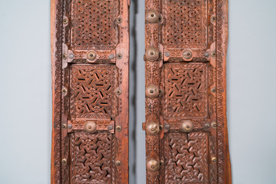 A pair of reticulated wooden doors with geometrical patterns, Northern Africa, 19th C.