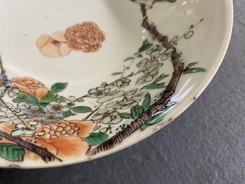A Chinese famille verte 'magpies and prunus' bowl, Kangxi