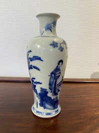 A Chinese blue and white 'two ladies and a boy' vase, Kangxi
