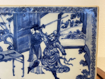 Een Chinese rechthoekige blauw-witte tegel met een onthoofdingssc&egrave;ne, Kangxi