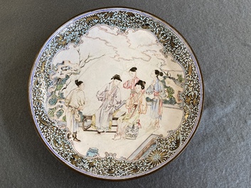 A Chinese Canton enamel 'flute players' dish with ruby edge on the back, Yongzheng