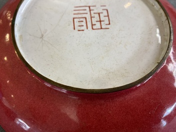 A Chinese Canton enamel 'flute players' dish with ruby edge on the back, Yongzheng