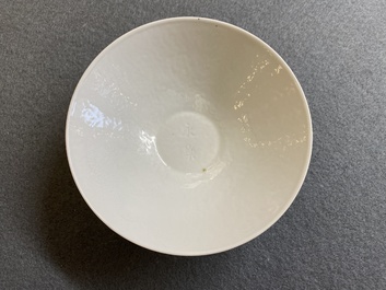 A Chinese white-glazed 'dragon' bowl with anhua design, Yongle mark, Qing